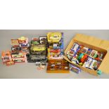 A quantity of boxed diecast models, contained in two trays, by Corgi, Lledo,