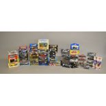 A quantity of boxed diecast models by Corgi, Autoart,