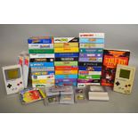 Nintendo Game Boy: Two Nintendo Game Boy and a Light Boy,approx 42 games, including Worms, Pokemon,