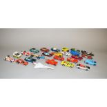 Twenty five unboxed Corgi Toys diecast models by Dinky and Corgi, mostly 'Whizzwheels' variants.