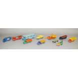 Eleven unboxed Dinky Toys diecast commercial vehicle models with varying degrees of play wear,