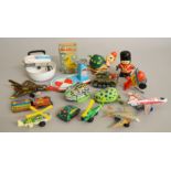 Quantity of tinplate and plastic clockwork toys, mainly Japanese, including an Alco frog,