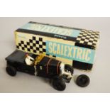 Triang Scalextric C64 Bentley with black body, black seats and white driver.