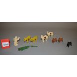 Nine flock covered hollowcast animals, including two cheetahs and a polar bear.