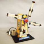 An unboxed Meccano motorised Shop Display model of a Windmill with lights on wooden base,