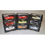 Nine Minichamps 1:43 scale diecast model cars,