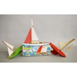 A vintage boxed Giner (Spain) Pond Yacht, 40cm approx, of metal wood and plastic construction,
