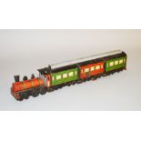 An unboxed vintage tinplate clockwork rigid Floor Train model by OROBR (Germany),