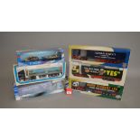 Five boxed diecast 1:50 scale truck models by Cararama, Eligor etc.