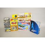 A quantity of packaged diecast models by Corgi, Matchbox and others,