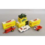 Four boxed Dinky Toys diecast models, 255 Ford Zodiac Police Car, 2 x 321 MH Manure Spreader,