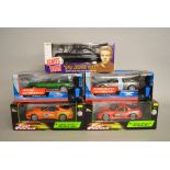 Five 1:18 scale TV related diecast model cars: Racing Champions The Fast and the Furious 1995