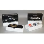 Two boxed Minichamps Maserati diecast model cars in 1:18 scale,