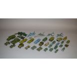 A quantity of unboxed diecast military and aircraft models by Dinky,