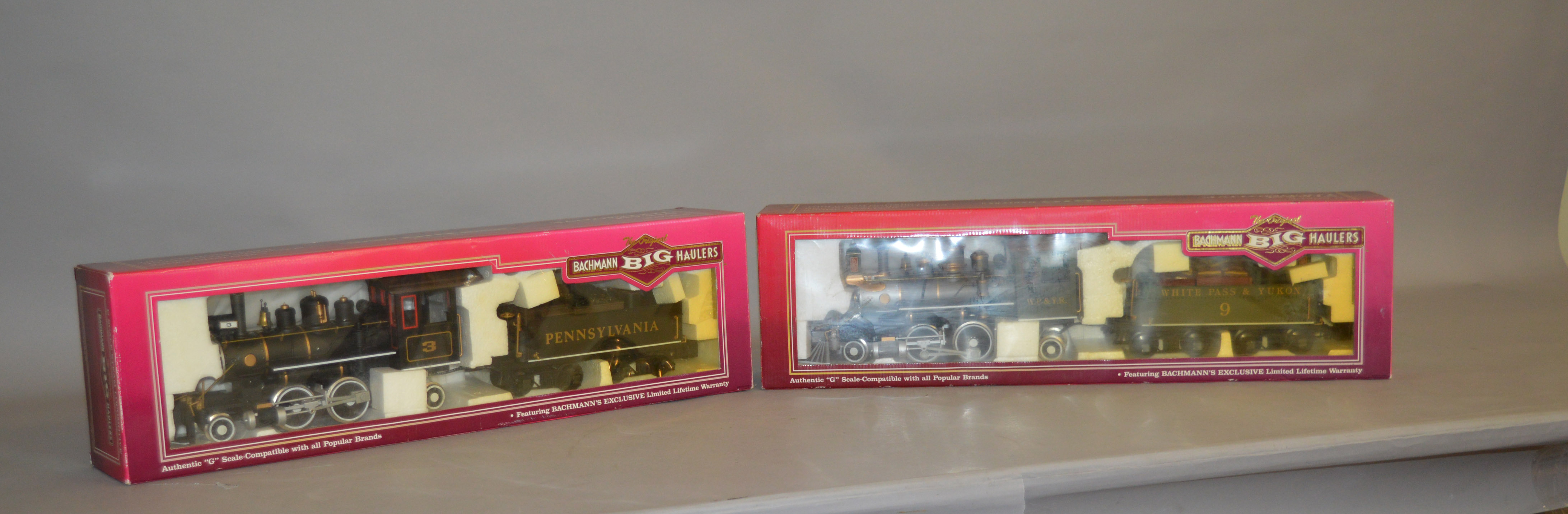 G gauge. Two Bachmann Big Haulers 2-4-2 locomotives: 91119 White Pass & Yukon; 91114 Pennsylvania.