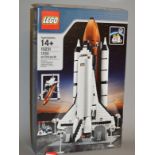 A boxed Lego 10231 Shuttle Expedition Space Shuttle set.