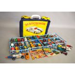 A small quantity of unboxed playworn diecast models in various different scales by Matchbox, Dinky,