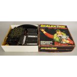 A Scalextric 'Action Set' box containing a quantity of track,