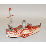 An unboxed vintage tinplate clockwork Paddle Steamer model by OROBR (Germany),