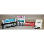 Six boxed diecast model trucks in a variety of scales by Corgi,