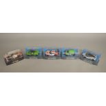 Five Scalextric slot cars: C3743 Mini Cooper S; C3892 McLaren 720S; C3756 McLaren P1;