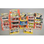 Twenty three boxed diecast F1 and other model cars by Polistil in various different scales.