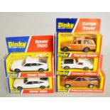 Five boxed Dinky Toys diecast model cars, 123 Princess 2200HL, 2 x 180 Rover 3500,