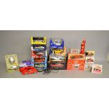 A collection of larger scale diecast models by Revell, Maisto, Bburago and similar.