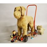 A mixed lot of toys: Triang push along dog; Chiltern dog; Bakelite Minnie Mouse; costume dolls;
