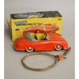 A boxed Distler 'Electro Matic 7500' steerable tinplate battery operated car with detailed interior
