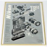 A Glazed 1993 Nikon Poster Showing an Exploded Diagram of Nikon F System. In a glass frame 18.
