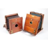 Two Wholeplate Brass & Mahogany Cameras. One marked Albert E. Doe Norwich and another marked Chr.