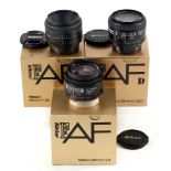 Three Boxed Nikon Autofocus Lenses. Comprising Nikkor 28mm f2.8 D #453457; Nikkor 24mm AF 2.