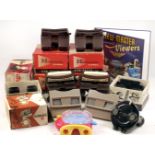 Quantity of Viewmaster Stereo Viewers and a Book.