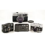 Four Good Quality Compact Film Cameras. Comprising Ricoh R1 with 30mm f3.