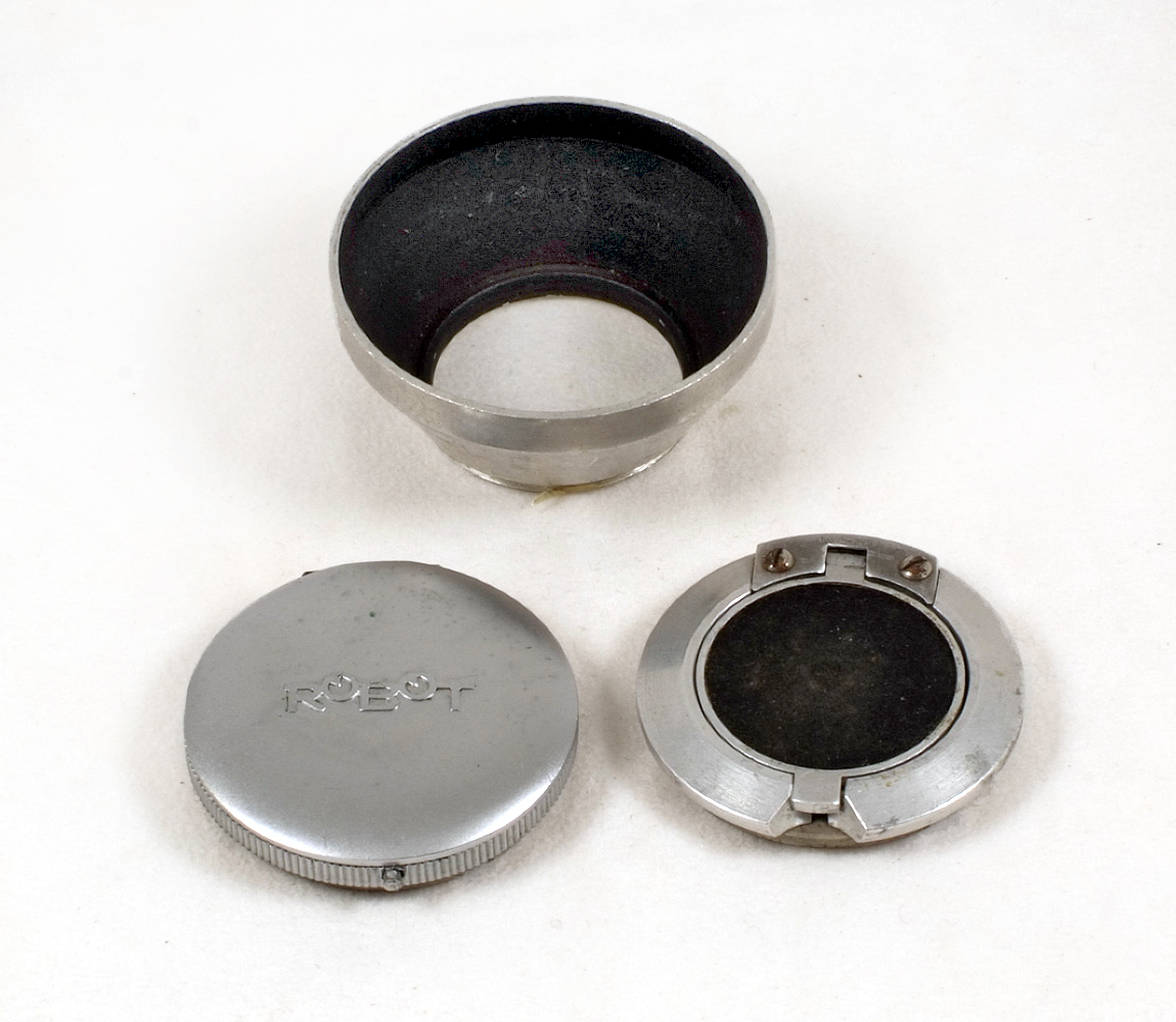 Two Rare Robot Lens Caps, Flip-up Versions. (condition 5/6). Also an after-market lens hood.