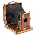 Gandolfi Half Plate Wood & Brass Field Camera. With rising front. Several rips in bellows.