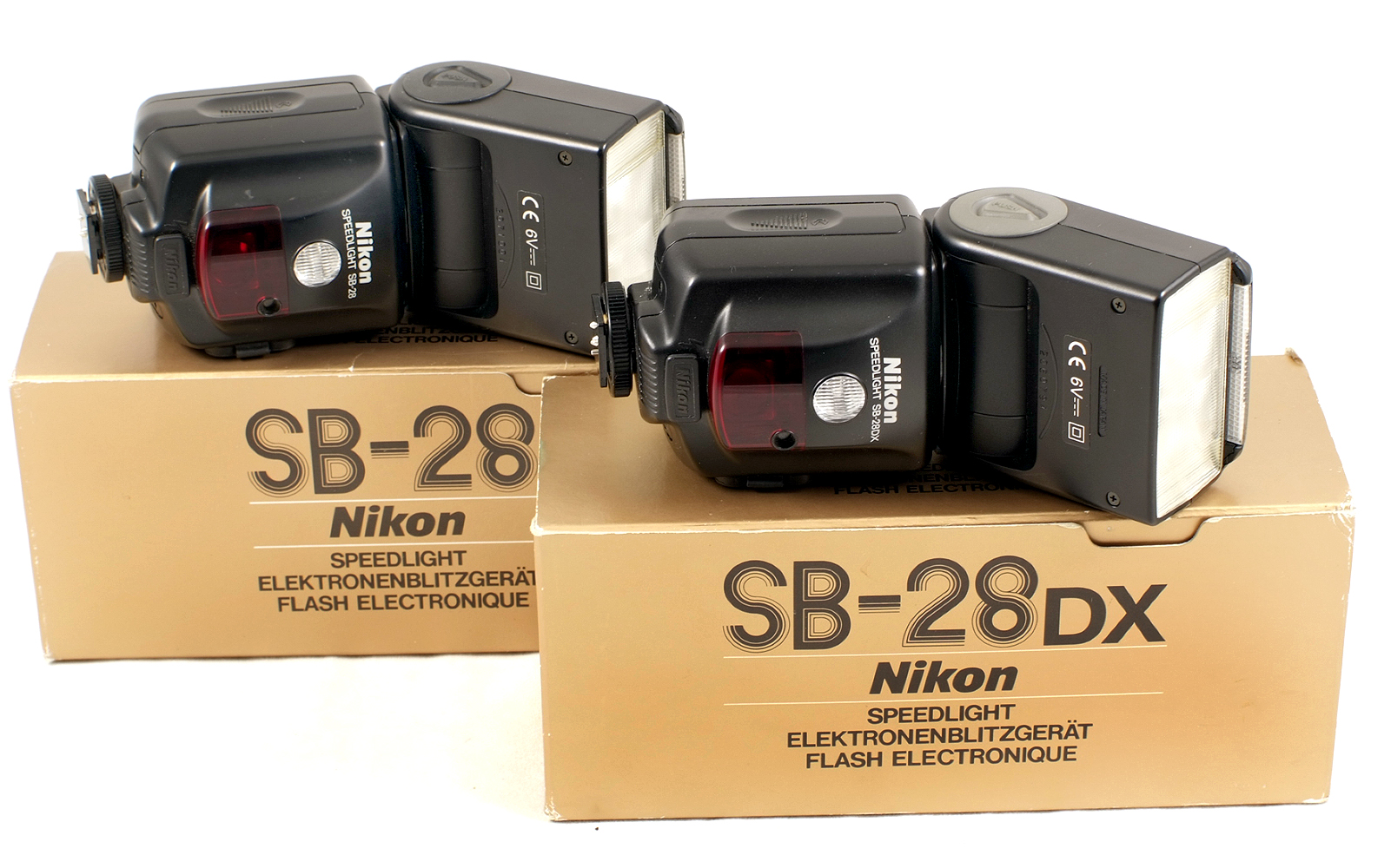 Four Nikon SB Flash Units. Comprising SB12, SB23, SB28 and SB28DX (condition 5F). - Image 2 of 2