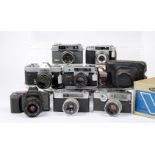 Seven 35mm Film Cameras.