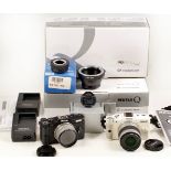 Extensive Pentax Q Mirrorless Digital Camera Outfit.