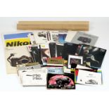 A Quantity of Nikon, Leica & Sony Brochures & Instructions. With two Nikon range posters (in tubes).