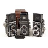 Three Zeiss Ikon Ikoflex TLR Cameras.