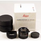 Black Leitz Summicron-M 35mm f2 lens #3683089. (Tiny dust and specs inside, otherwise condition 5F).