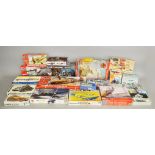 Twenty three boxed model kits by Airfix, Revell, Tamiya and others,