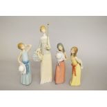 4 Lladro figures.