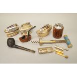 A mixed lot of tobacciana including Ronson lighters, two vintage pipes and a French corkscrew.