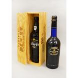 A bottle of FONSECA GUIMARAENS (Portugal) BIN No27 Fine Reserve Port with wooden crate.