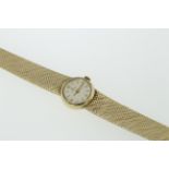 OMEGA - A 9ct ladies Omega manual-wind wristwatch H/M London 1966, on an integrated 9ct bracelet,