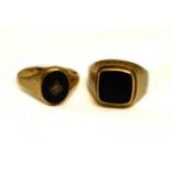 Two 9ct H/M gents onyx set signet rings, one onyx chipped on edge, sizes: T & W,