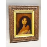 A Crystoleum - portrait of an attractive lady, with period frame. 27cm x 21cm.